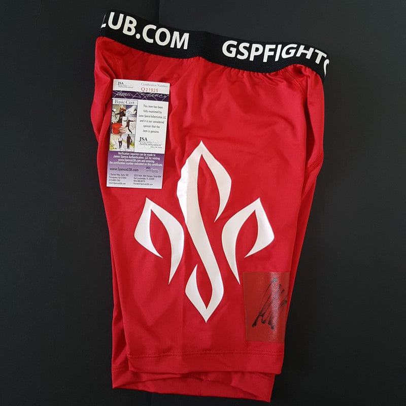 GEORGES ST-PIERRE GSP SIGNED UFC TRUNKS - 24K GOLD PLATED NAME PLATE + FULLY FRAMED - SOLD